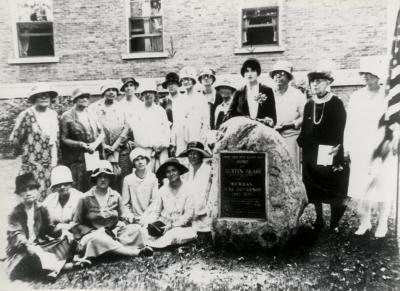 Women with Governor Austin Blair Memorial in Park