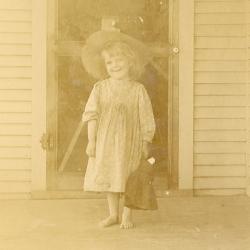 Unidentified girl on a porch